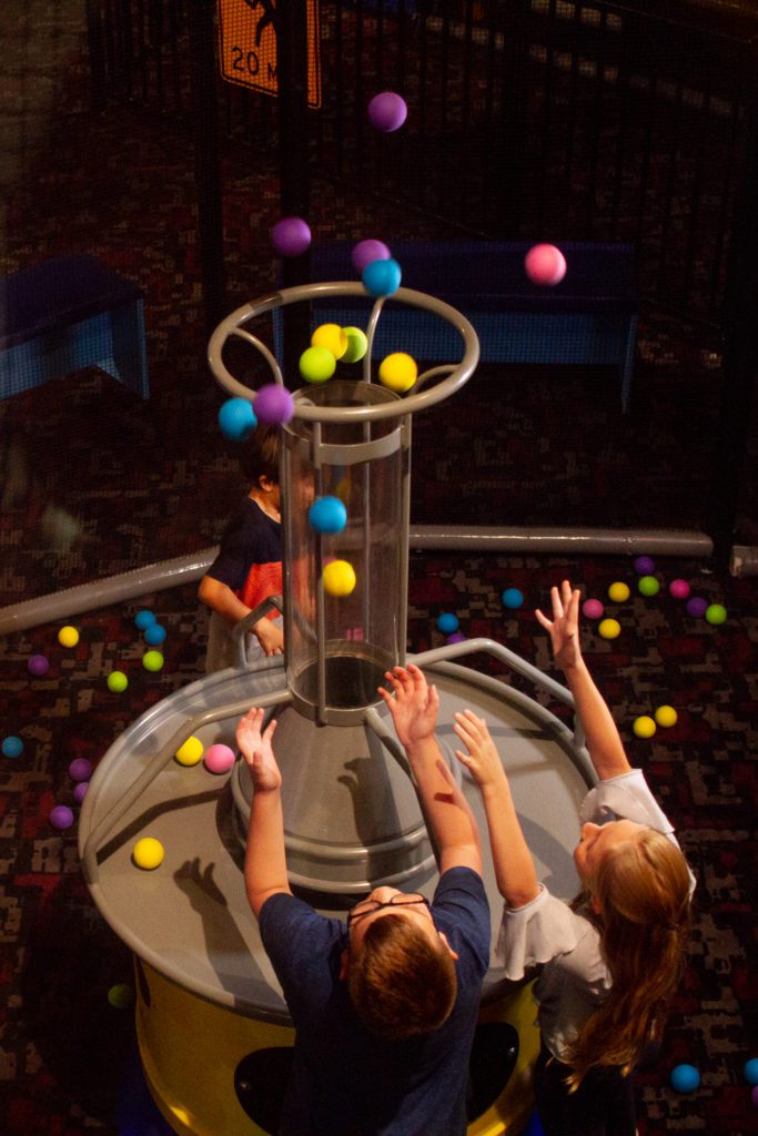 Children play during a STEM school field trip