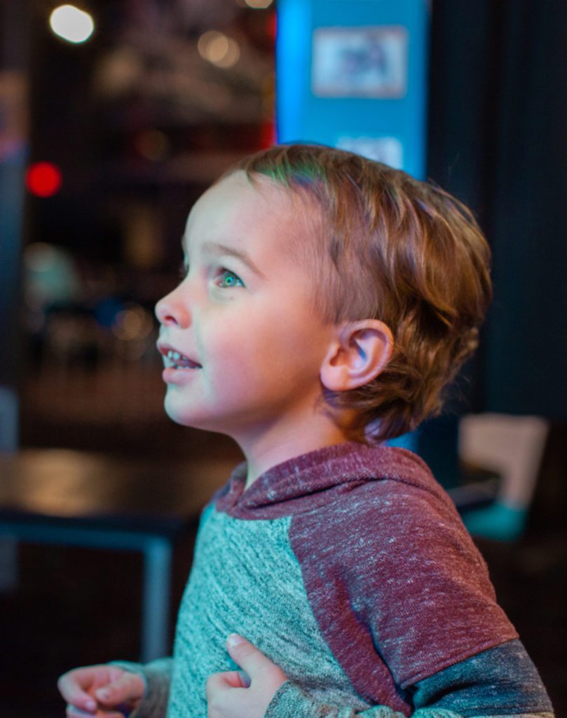 Child enjoys the arcade