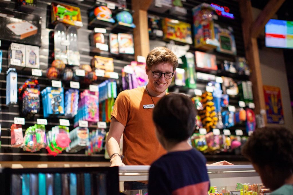 Child picking a prize at the family entertainment center